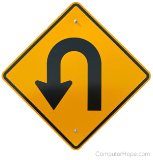 U-turn symbol on an orange sign.